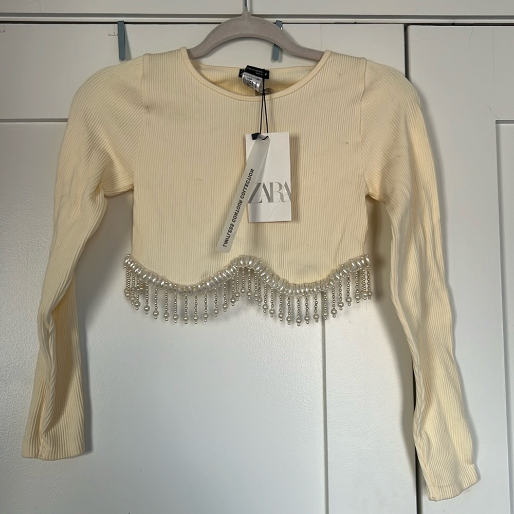 Ivory Zara top with beading detail size x small